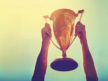 2022 MSAA Art Showcase accepting submissions/Multiple Sclerosis News Today/hands holding trophy aloft image