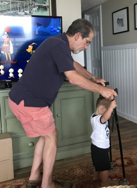 Teaching my grandson to walk.