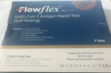 COVID-19 booster | Multiple Sclerosis News Today | Photo of a rapid home self-test kit for COVID-19, which John received from the NHS.