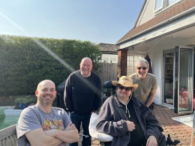 UTI | Multiple Sclerosis News Today | Three former co-workers of John's at London's Comedy Store, comedians Simon Mason, Steve Gribbin, and Ian Stone, join John recently in his sunny backyard north of London.