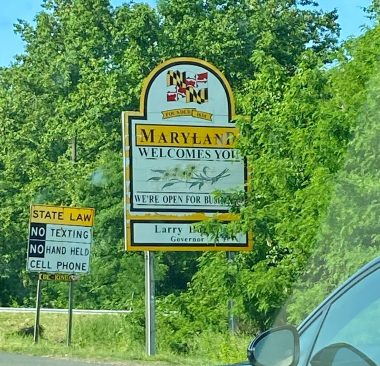 bladder incontinence | Multiple Sclerosis News Today | A white and yellow road sign says, "Maryland Welcomes You." 