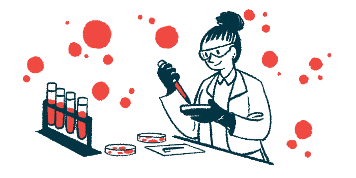 A scientist works in a lab, holding a filled dropper as test tubes are set up nearby.