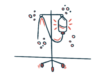 An infusion treatment hangs from an IV pole.