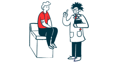 A doctor consulting with a patient who is seated on an examining table.