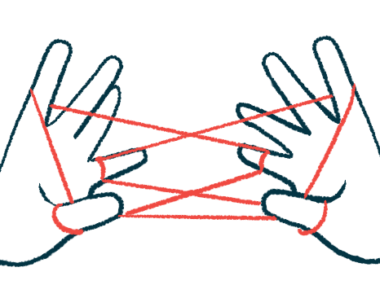 A pair of hands play the children's string game cat's cradle.