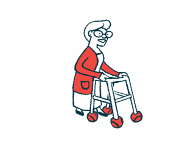 An elderly woman uses a walker as a mobility aid.