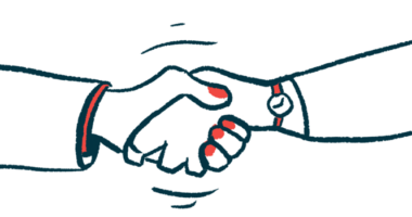 Two people shake hands, signifying an agreement.