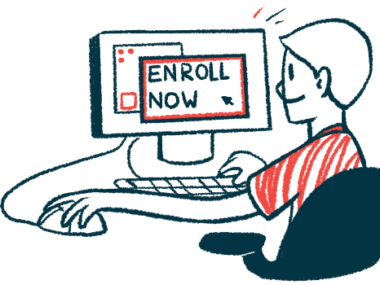 A man sits at a computer monitor, with his hand on the mouse, as the screen reads 