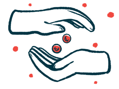 A hand is seen dropping coins into an open palm.