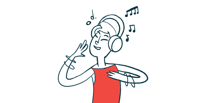 A person with a headset on grooves to music.