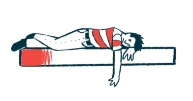 A person is shown lying on his stomach on a bed.