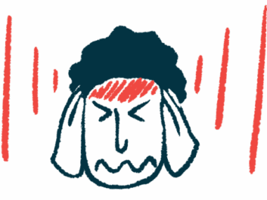 A person grimaces and holds his head while red lines are shown radiating from the forehead.