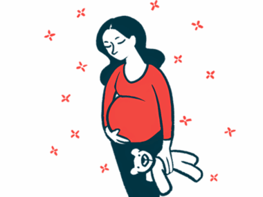 A pregnant woman holds her belly and a teddy bear.