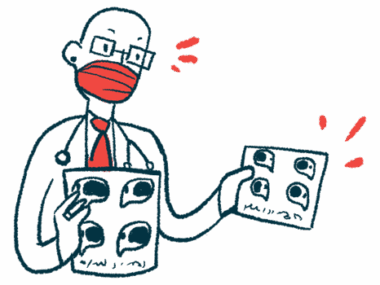 A doctor wearing a face mask holds a pair of imaging scans.