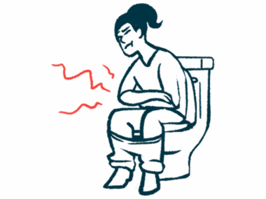 A person experiencing gastrointestinal pain is seen sitting on a toilet.