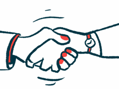 Two people's hands are seen clasped together in this close-up view of a handshake.