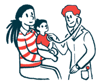 A doctor listens to a child's heart with a stethoscope as she sits on her mother's lap.