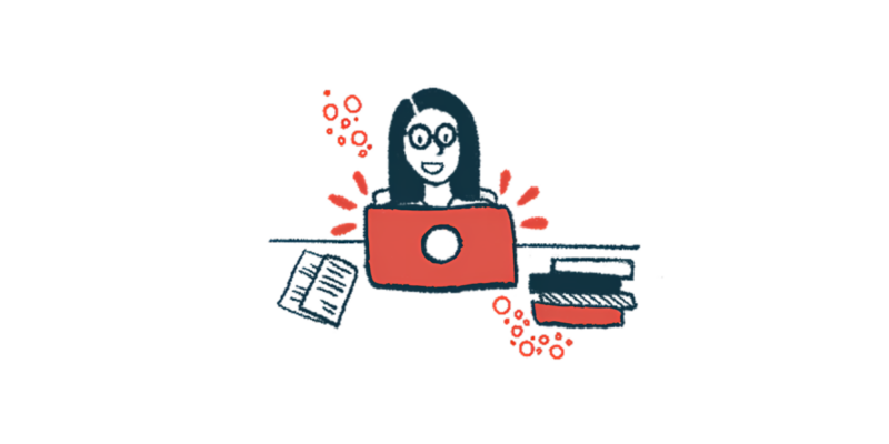 A person at work uses a laptop amid documents and a stack of books.