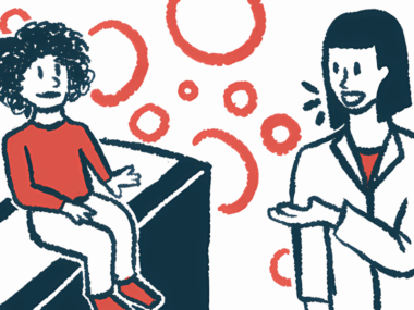 A child sits on an examination table listening to a doctor speak.