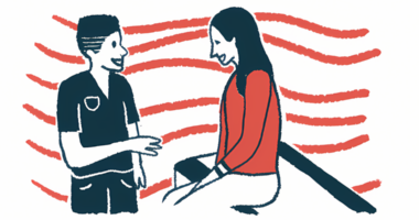 A doctor talks to a patient seated on an examination table.