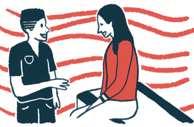 A doctor talks to a patient seated on an examination table.