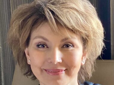 Regina Berkovich, MD, PhD, is pictured in a professional headshot photo.