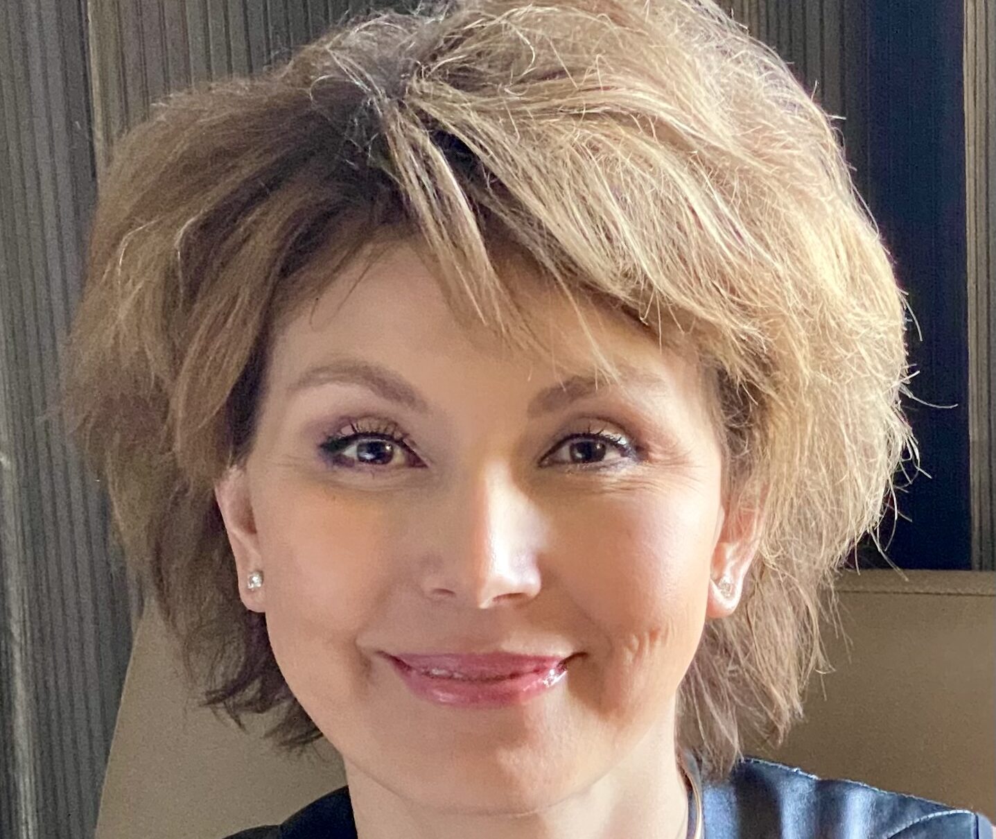 Regina Berkovich, MD, PhD, is pictured in a professional headshot photo.