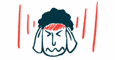 A person grimaces and holds his head while red lines are shown radiating from the forehead.