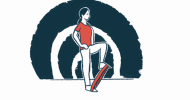 A woman exercises using a resistance band.