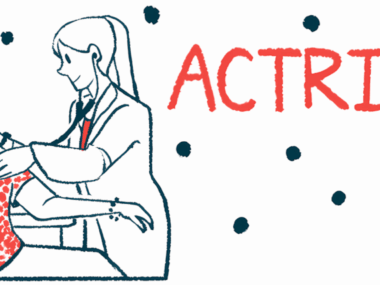 A doctor examines a person in a wheel chair.