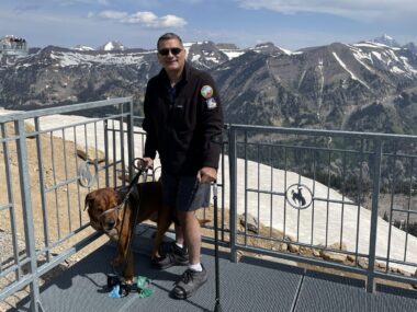 Izzy Abbass and his dog Arkasha are pictured at the gondola's top point in Grand Teton National Park.