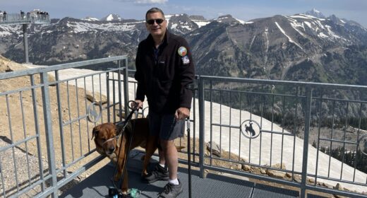 Izzy Abbass and his dog Arkasha are pictured at the gondola's top point in Grand Teton National Park.