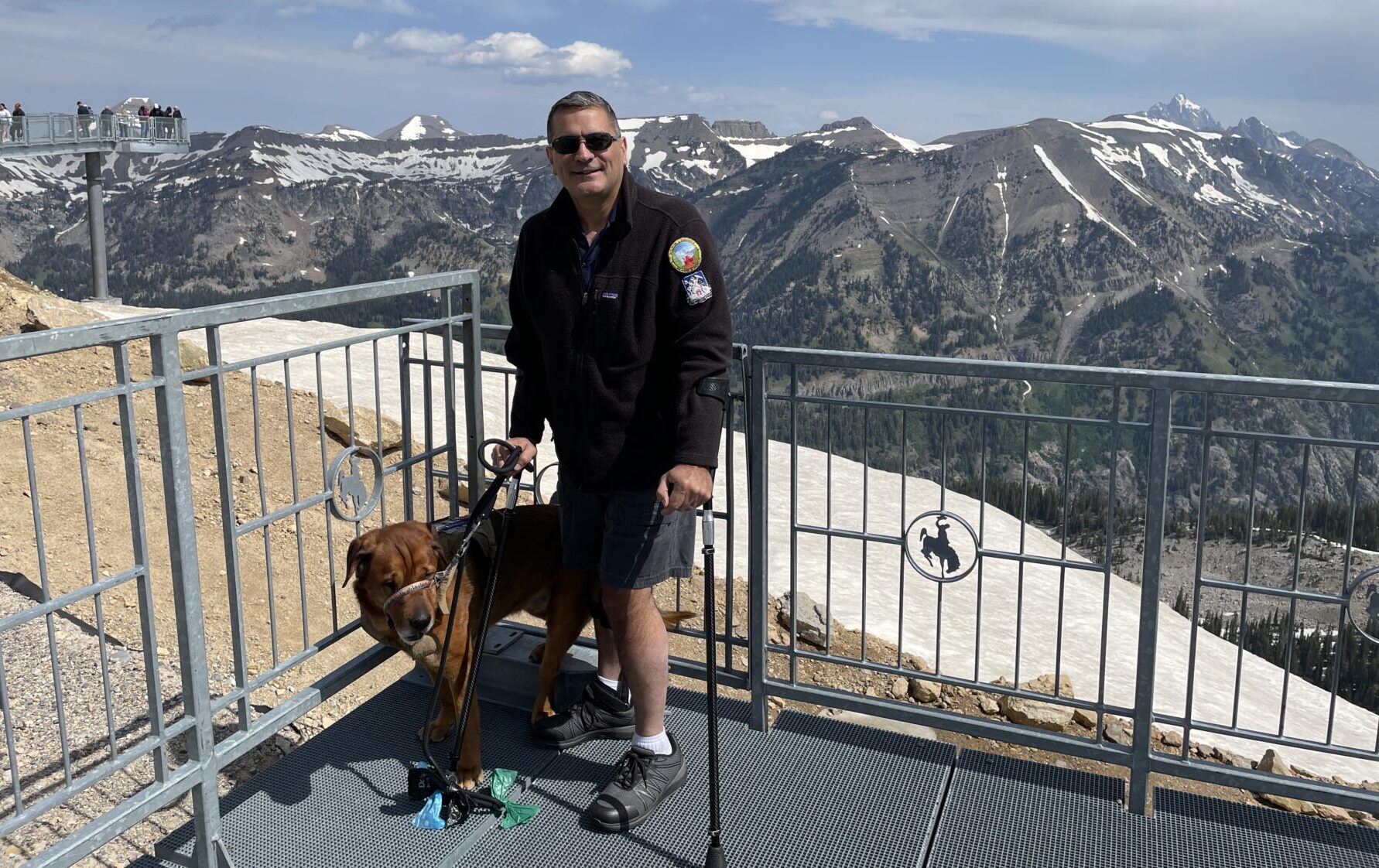 Izzy Abbass and his dog Arkasha are pictured at the gondola's top point in Grand Teton National Park.