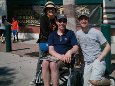 Donald Kushner, center, takes in Pirates spring training games in Florida with his wife Robin, left, and son Sidney, right.