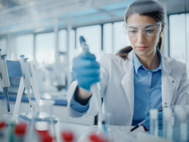 A scientist works in a lab.