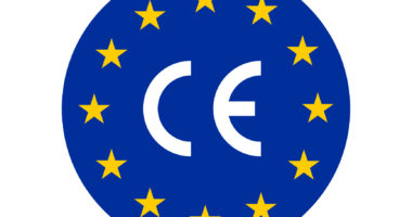 A circle with the letters CE surrounded by stars.