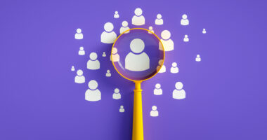 An image shows an array of icons representing people, with one magnified.