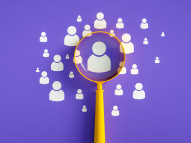 An image shows an array of icons representing people, with one magnified.
