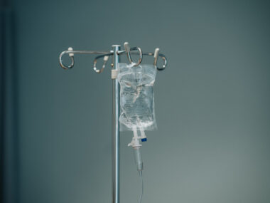 A photo shows an IV bag.