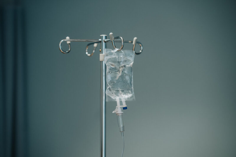 A photo shows an IV bag.