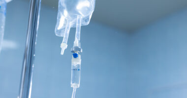 A photo shows an IV drip.