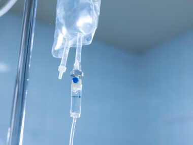 A photo shows an IV drip.