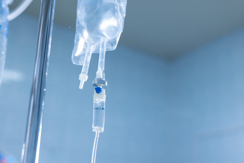 A photo shows an IV drip.