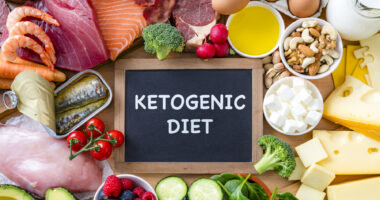 A photo shows salmon, tuna, and other ingredients of a ketogenic diet.