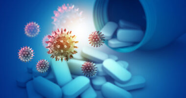 Illustration shows viruses floating above pills spilling out of a bottle.