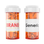 Two prescription bottles labeled “Brand” and “Generic,” each filled with orange capsules.