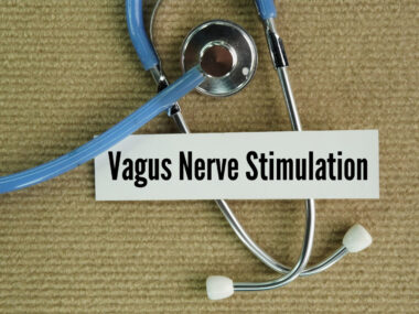 Image of a stethoscope beside a card reading “Vagus Nerve Stimulation.”