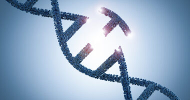 Illustration of a blue DNA double helix with several pink segments against a light blue background.